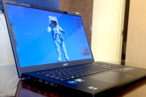 CES 2024: Your eyes aren't deceiving you. Arms are 'sticking out' of this 3D laptop.