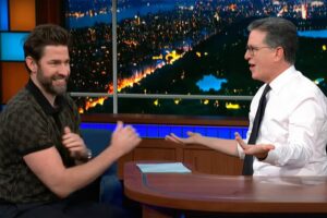 John Krasinski takes on Stephen Colbert in a brutally tense arm wrestle